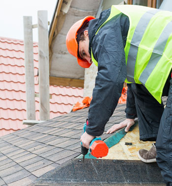 Boise Idaho Roof Contractor installing shingles